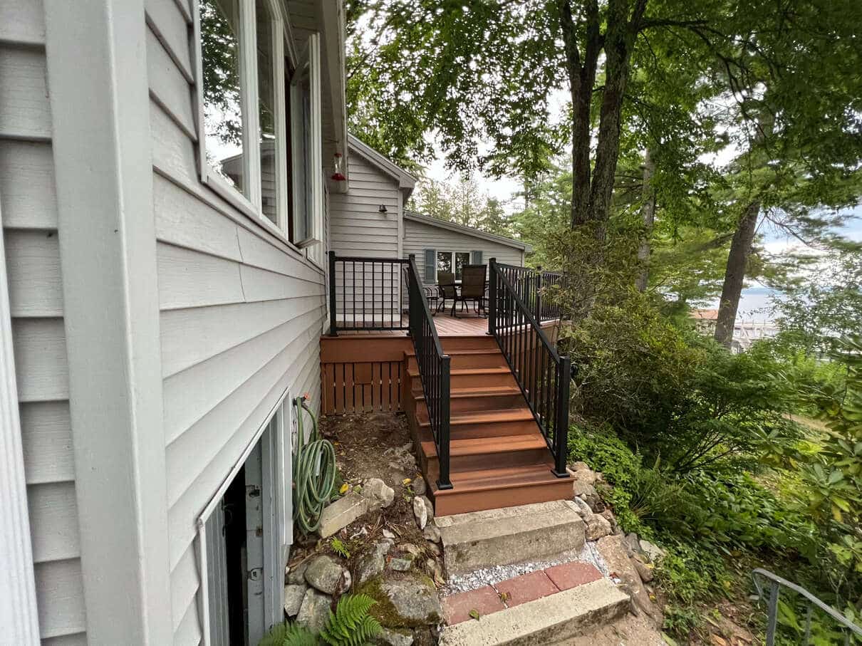 photo of a composite deck with deck railing and steps