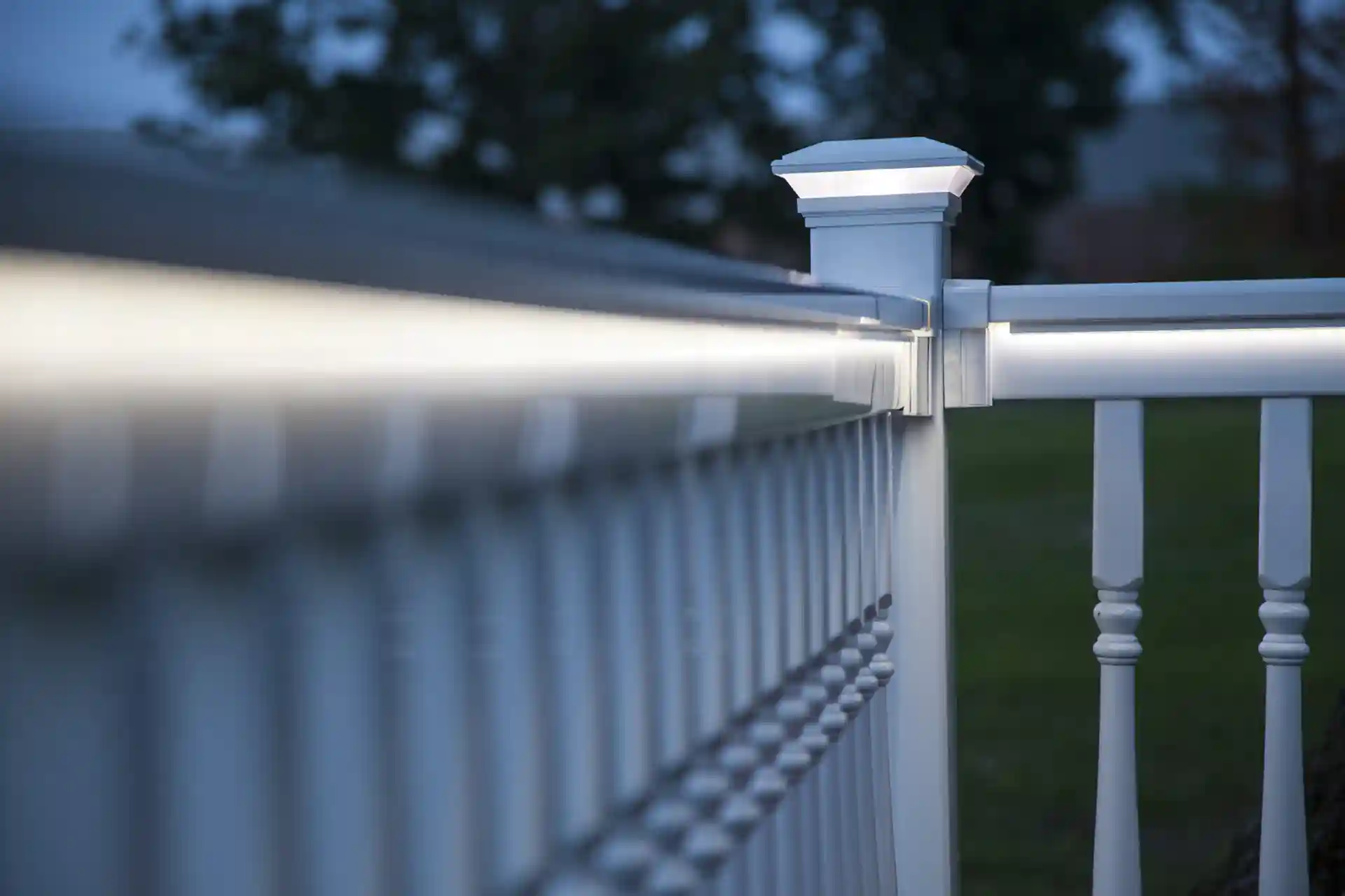 Photo from Barrette Outdoor Living that shows the kind of railing and post cap lights the company offers