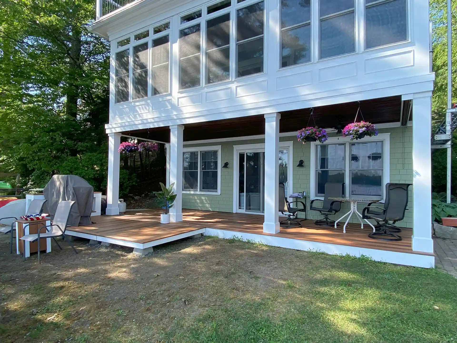 Photo of a ground-level deck built with DuraLife decking by Barrette Outdoor Living Decking